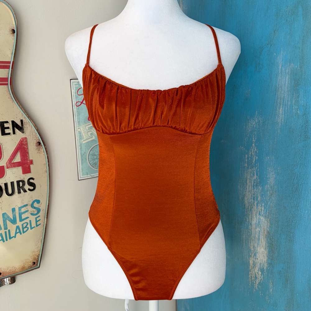 Out From Under Metallic Rust Strappy Open Back Bodysuit